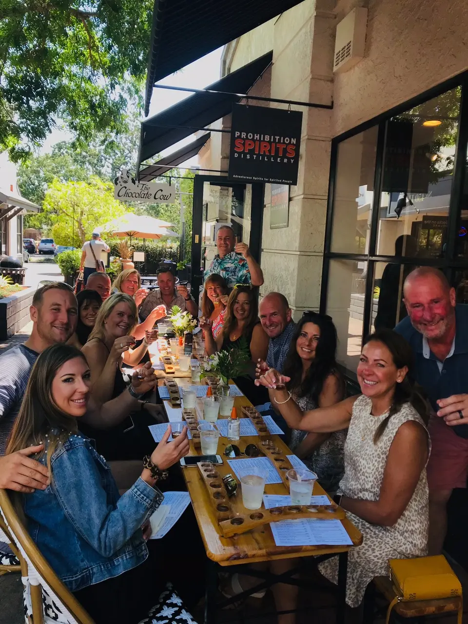 Friends enjoying a spirits tasting outside in Sonoma